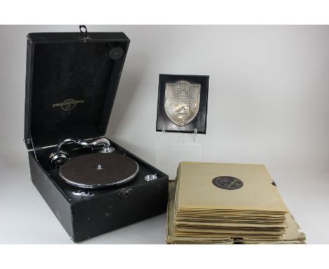 An HMV portable gramophone record player with additional No 5 sound box in card box, a silver commemorative plaque with shiel