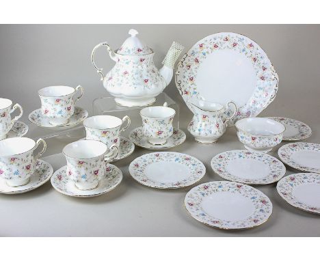 A Paragon china tea set of teapot, sugar bowl, cream jug, six cups and saucers, side plates and sandwich plate, in pink flora