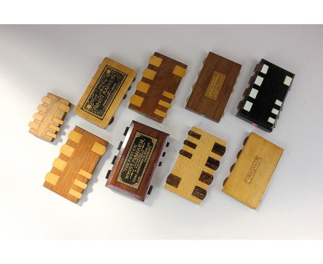 A pair of The Foster whist markers together with six other wooden whist/card markers and a smaller whist marker, together wit