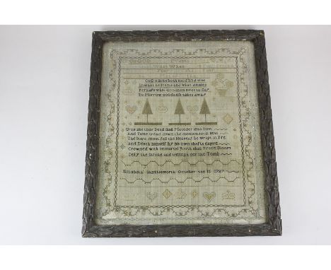 An 18th century sampler with religious verse, trees and motifs, worked by Elizabeth Shuttleworth, October 12th 1787, 39cm by 