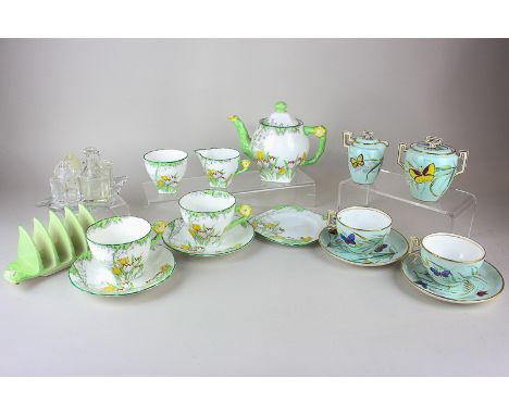 A Delphine china Art Deco tea set of teapot, sugar bowl, milk jug and two cups and saucers, a Royal Winton toast rack, a four