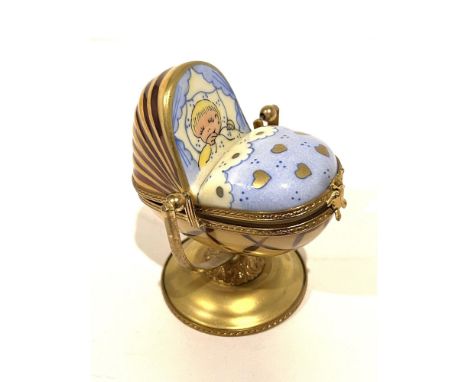 Highly Detailed Hand painted fine porcelain mini box with baby boy in pale blue baby crib in blue white and gold that rocks b