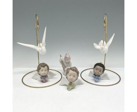 Beautiful handmade and hand painted ornaments. Lot includes - 2 x white doves 3.25"L, 3 x seraphs adorned with bells, bow and