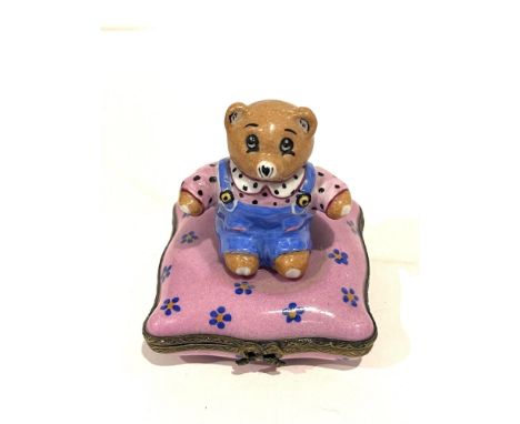 Completely hand painted the sweetest little teddy bear is in blue coveralls sits atop a floral patterned pillow on this exqui