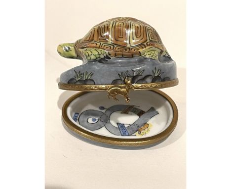 Precious Green and Brown Turtle on egg shaped ocean blue porcelain mini box is beautifully detailed. Vegetative decorative ed