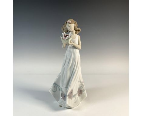Glossy figure holding a basket with butterflies around it. Lladro backstamp. This item has its original box: 8.5"L x 15"W x 7