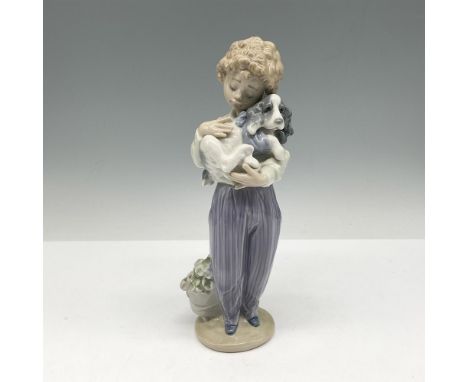 Glossy figural holding his dog was Collectors Society figurine for 1989. Soft coloration of white, violet and sage. Lladro ba