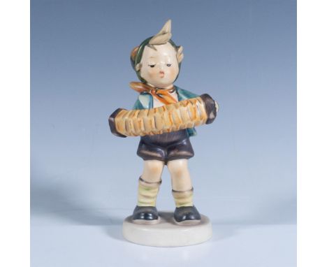 Matte finish. Depicts a boy in green and brown clothes playing music. Goebel backstamp. Artist: M. I. HummelIssued: 20th cent