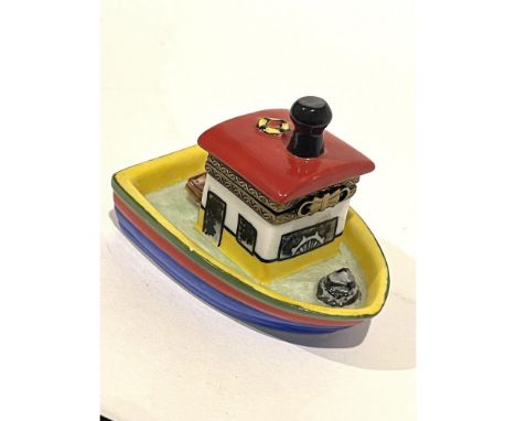 Authentic French porcelain hinged miniature Tug Boat is whimsical and colorful. Hand painted with so much detail even a life 