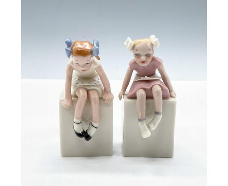 Rare glossy porcelain duo, features two versions of the charming twin figurines sets. Depicting adorable girls sitting naivel