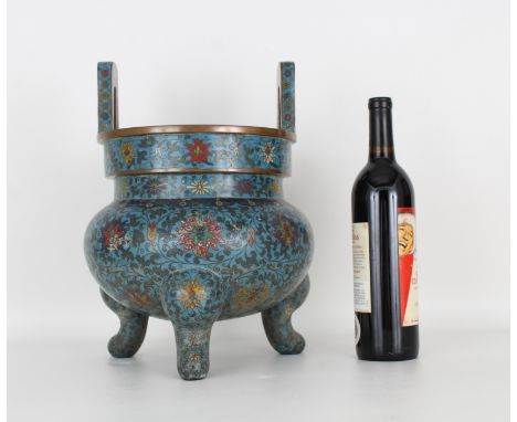 Chinese Cloisonne Enamel Tripod Censer. The compressed bulbous body with a pair of vertical bail handles, the body decorated 