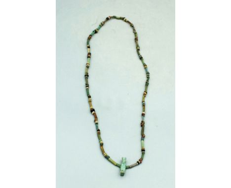 Egyptian faience bead necklace, Late Period, ca. 664 - 332 BC. It is 20 inches long and is comprised of fine faience tubular 