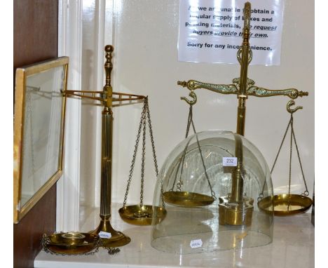 Two brass balance scales; a glass dome and an embroidered pole screen (4)