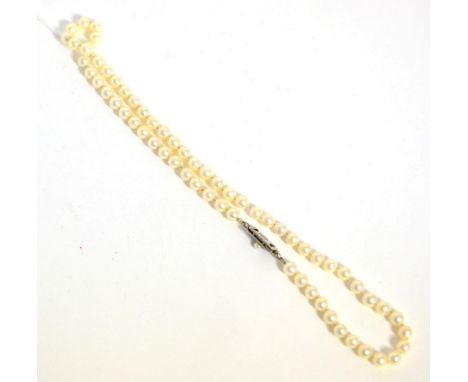 Mikimoto cultured pearl single strand necklace, with a pearl set clasp, stamped with Mikimoto maker's mark, length 44cmGood o