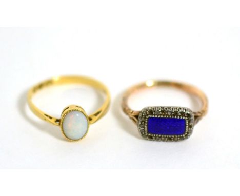 An enamel and diamond ring and an 18 carat gold opal ring (2) Enamel and diamond ring - FInger size L, 2.78g gross. Opal ring