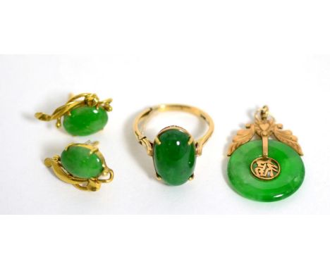 A jade ring, pair of jade earrings and a jade bi pendant Jade ring - Finger size O, 4.5g gross. Earrings - 3.35g gross. Penda