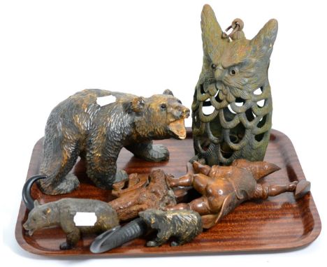 A Black Forest group of bears and cubs, similar gnome coat rack and cast iron owl pendant lamp 