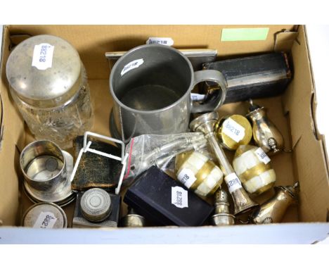 A silver cigarette case, a collection of silver salts and pepperettes etc