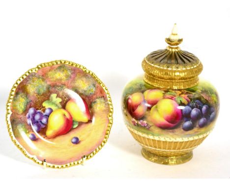 A Royal Worcester vase and cover, painted with fruit and signed Thomas Lockyer; together with a later fruit painted saucer si