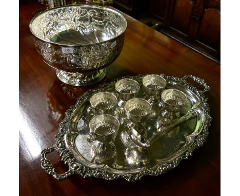 A large silver plated punch bowl by Viners, with six cups and ladle; together with a large twin handled silver plated tray 