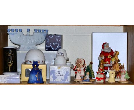 A group of Royal Doulton Bunnykins Christmas figures; Father Christmas D6940 Limited Edition 2838/3500; Christmas Joy HN5548;