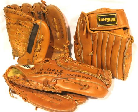 Three leather American baseball mitts with a Rawlings Official League baseball. P&amp;P Group 2 (£18+VAT for the first lot an