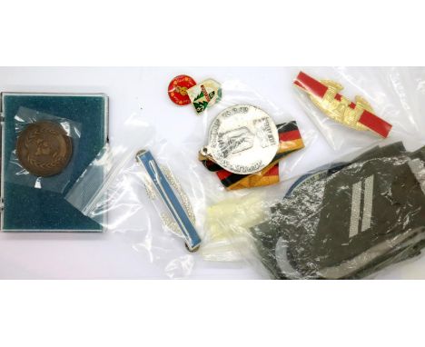 Mixed Russian and West German badges and uniform patches. P&amp;P Group 1 (£14+VAT for the first lot and £1+VAT for subsequen