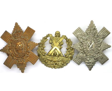 Victorian 42nd Royal Highland Regiment of Foot Black Watch bonnet plate/cap badge, with two further Highlands badges (3). P&a