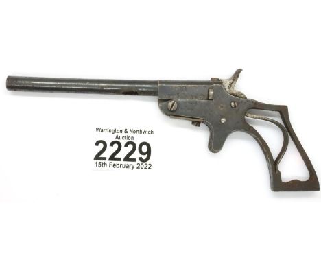 1919 dated single shot muff pistol, not working, lacking grips. Hole barrel approximately 1 x 0.25 cm. Hammer does cock as it
