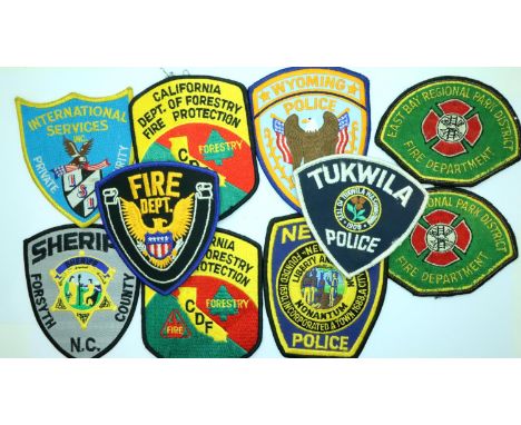 Ten American embroidered Police and Fire Department cloth badges. P&amp;P Group 1 (£14+VAT for the first lot and £1+VAT for s