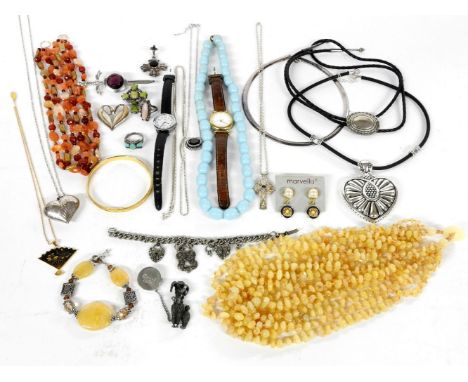 A quantity of costume jewellery, to include an eight row agate bead necklace, a silver heart shaped locket on a silver box li