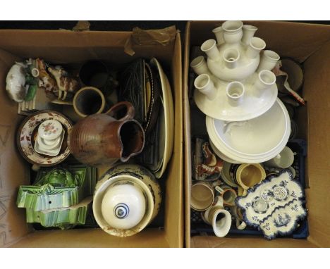 Two boxes of ceramics to include, a French faience inkwell, a Delft vase and cover, a modern tulip bulb vase, etc. (a/f)