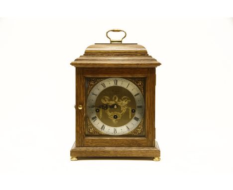 A modern Comitti mantel clock, three train movement, 30cm high