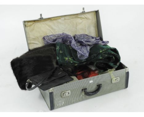 A quantity of vintage clothing, table linen, etc.