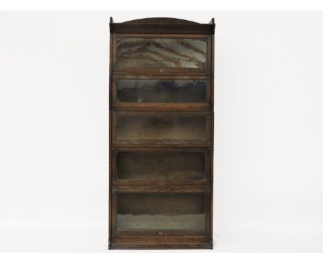 An early 20th century Lebus oak five section bookcase on outswept plinth base, 88 cm x 32 cm x 195 cm