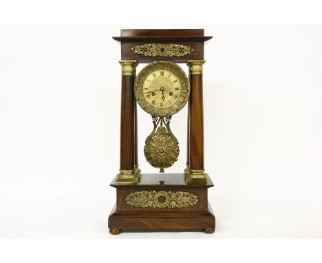 A mahogany Empire style portico clock, 51cm high, 89cm wide