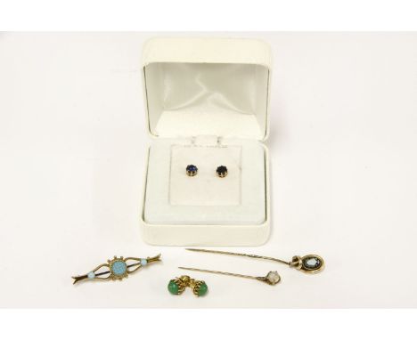 A gold memorial cameo stick pin, a gold claw sphere stick pin, a gold blue paste brooch marked 9ct, a pair of gold turquoise 