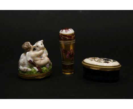 A 19th century porcelain snuff box in the form of a cupid with a lamb, the gilt metal mounted lid decorated with flowers, tog