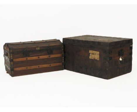 A dome top trunk with wooden slats, 83cm long, and another