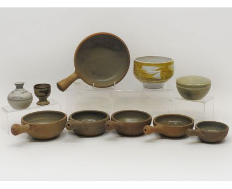 A Leach pottery box and cover, the lid with incised decoration, 10cm in diameter, together with a small Aldemaston pottery bo
