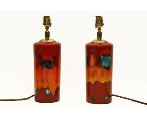 A pair of Poole pottery Delphis pattern table lamps, each 21 cm high