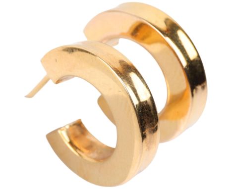 A pair of 9ct gold hoop earrings, with stud fittings, 18.2mm, 3.1g Condition Report: A few very light dents along with light 