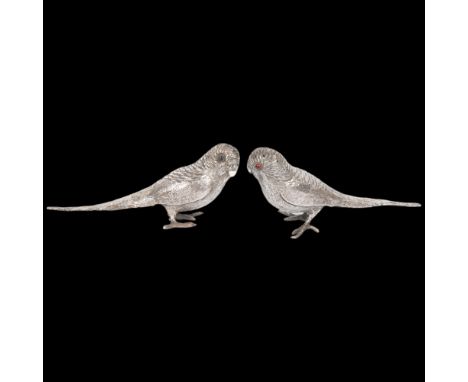 A pair of Edwardian novelty silver figural budgerigar bird pepperettes, George Bedingham, London 1904, realistically modelled