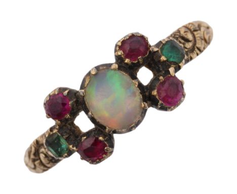 A Georgian opal ruby and chrysolite sweetheart ring, circa 1820, cut-down collet set with oval cabochon opal, and relief foli