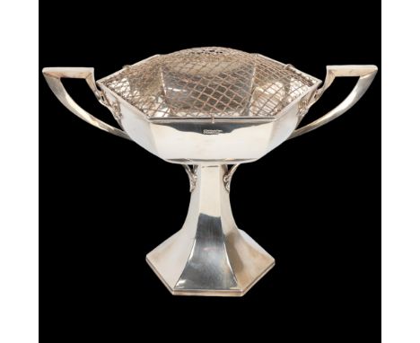 A large Art Nouveau George V silver 2-handled pedestal trophy cup, Walker &amp; Hall, Sheffield 1913, hexagonal form with sty