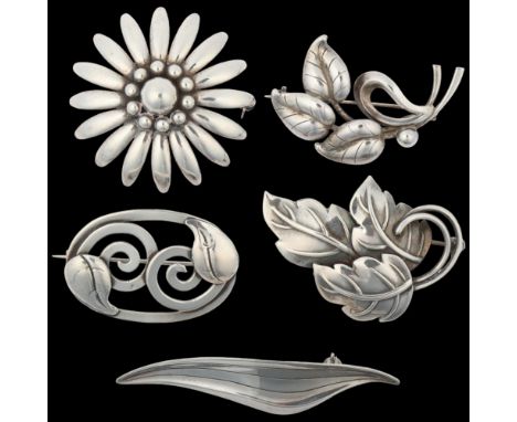 5 Danish silver floral brooches, makers include Hermann Siersbol, largest 66.6mm, 35.6g total (5) Condition Report: No damage