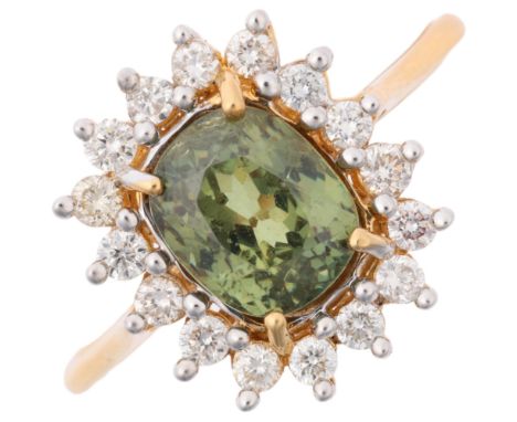A modern 18ct gold demantoid garnet and diamond flowerhead cluster ring, maker CR, Birmingham 2010, set with 2.85ct oval mixe