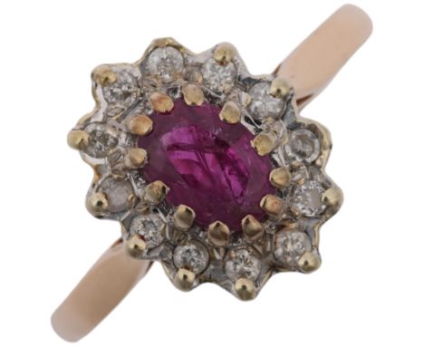 A late 20th century 9ct gold ruby and diamond oval cluster ring, maker MM Ltd, London 1983, setting height 13.2mm, size S, 2.