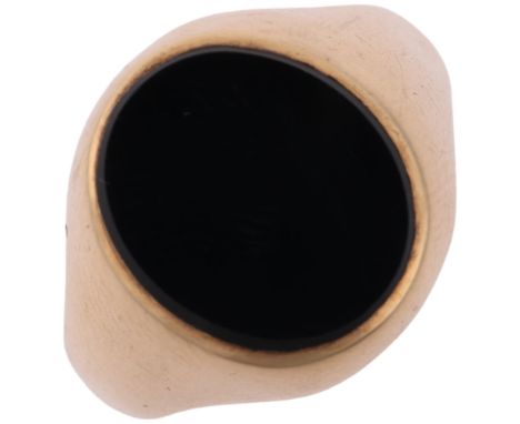 A late 20th century 9ct gold black onyx signet ring, maker HG&amp;S, Birmingham 1971, panel measures 12.8 x 11.0mm, size O, 4