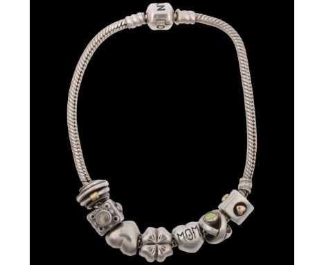 PANDORA - a sterling silver snake link charm bracelet, with 7 silver charms, 21cm, 37.5g Condition Report: No damage or repai